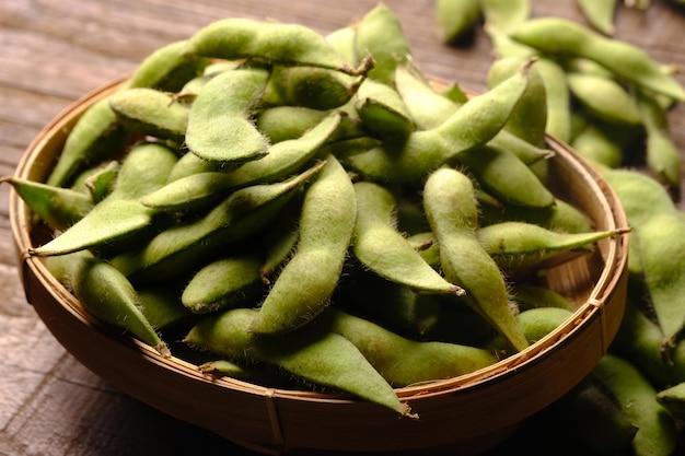 Edamame or mao dou in Chinese has the Latin name Glycine mas is a tropical plant