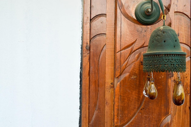 The edges of the Egyptian traditional bell tower bell on the building with brown glass balls