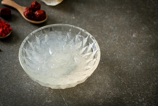 Edible bird's nest soup in glass bowl