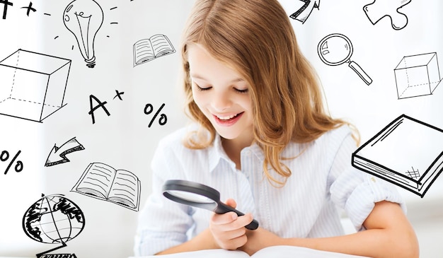 education and school concept - little student girl reading book with magnifier at school