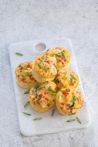 Egg muffins with ham cheese and vegetables