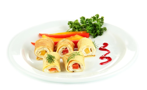 Egg rolls with cheese cream and paprikaon plate isolated on white