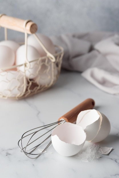 Egg shells with a whisk