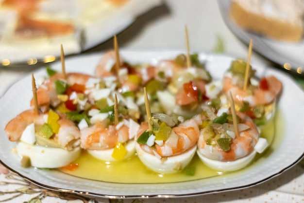 Egg shrimp and vinaigrette skewers prepared for the celebration dinner