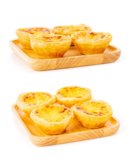 Egg tart the delicious crispy bekery on wooden plate isolated on white background