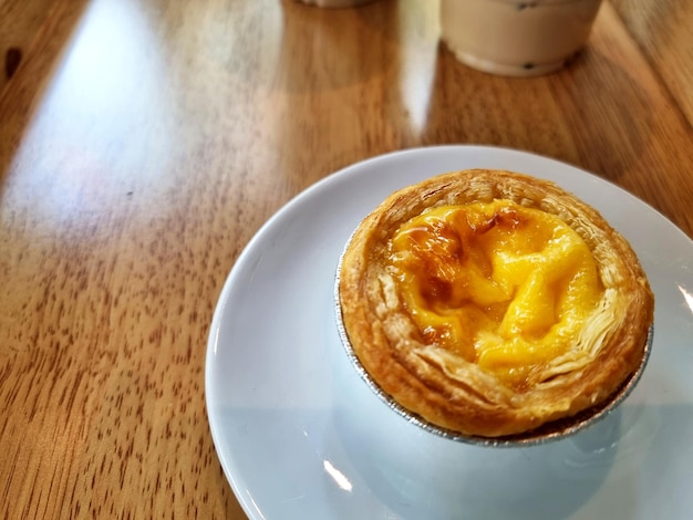 Egg tart on the wooden background