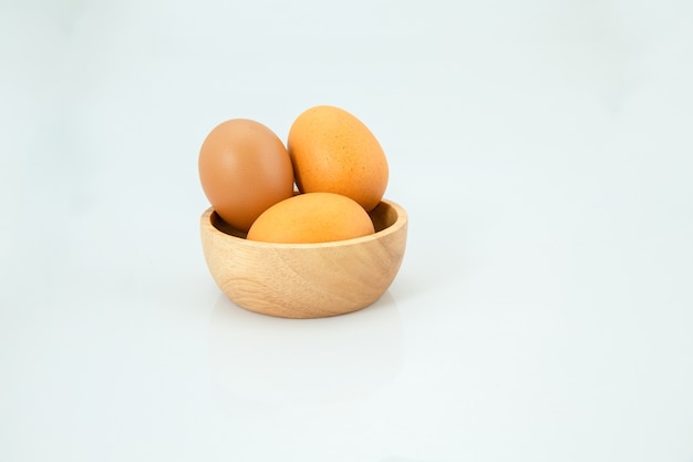 Egg on wooden spoon