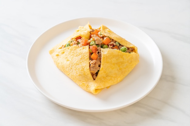 egg wrap or stuffed egg with minced pork, carrot, tomato and green pea