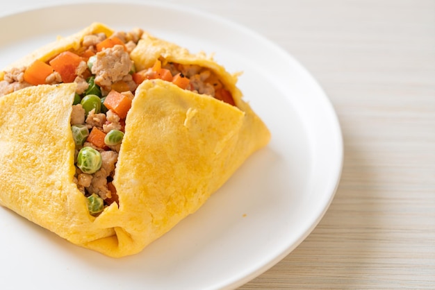 Egg wrap or stuffed egg with minced pork and vegetable