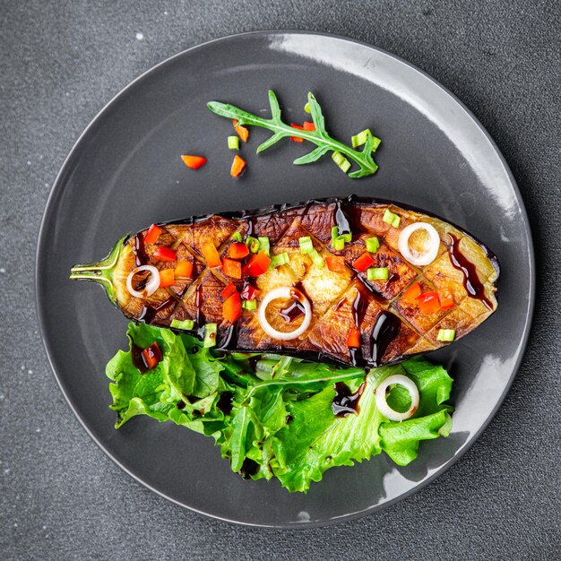 eggplant salad fried with vegetables healthy meal food snack on the table copy space food