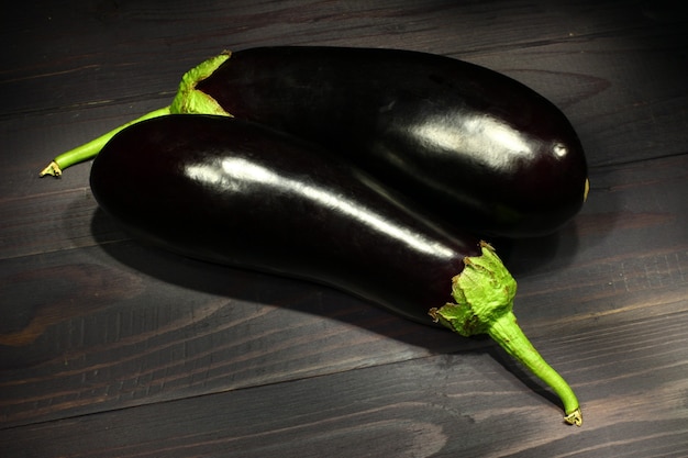 Eggplants on a dark background