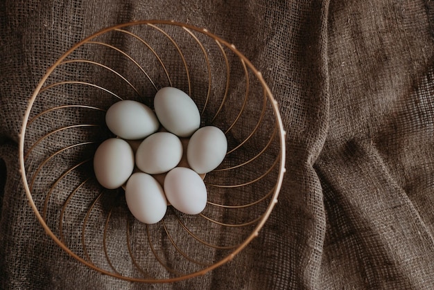 Eggs on a dark background White eggs Easter day