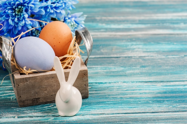 Eggs, flowers and decorative rabbit 