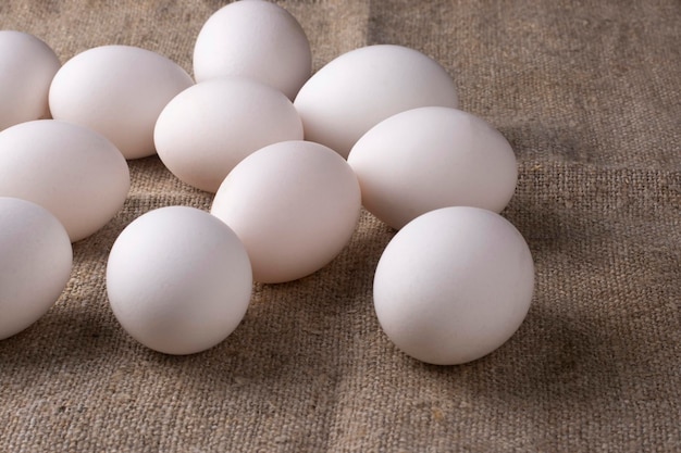 Eggs on a linen cloth close-up.