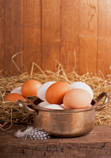 Eggs on old wooden table