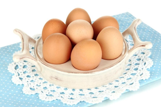 Eggs in plate for eggs isolated on white