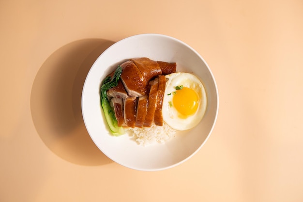 Eggs and roast duck on a plate