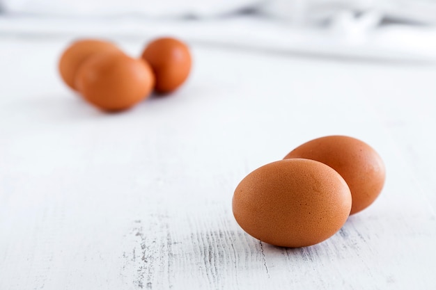 Eggs on wooden board