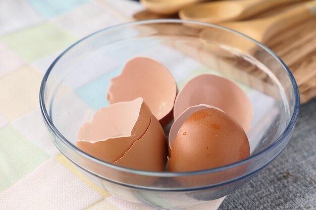 Eggshells in a white color bowl on table