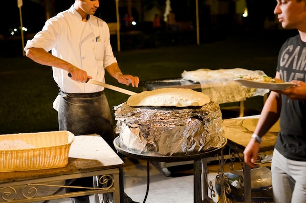 EGYPT SHARM EL SHEIKH the hotel chefs prepare the guest an openair dinner