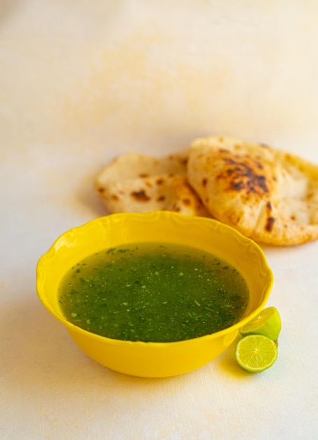 Egyptian molokhia soup with pita bread