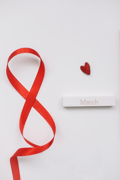 Eight made of red ribbon 8 March greeting card template International Women39s day background banner poster or brochure