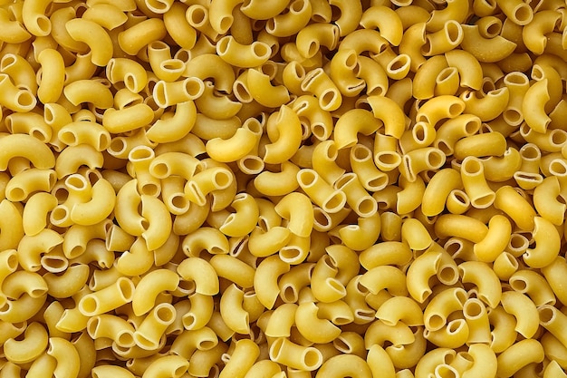 Elbow Macaroni with a smooth surface uncooked pasta background