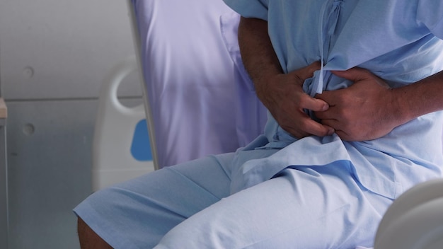 Elderly Asian male patient is hospitalized with stomachache