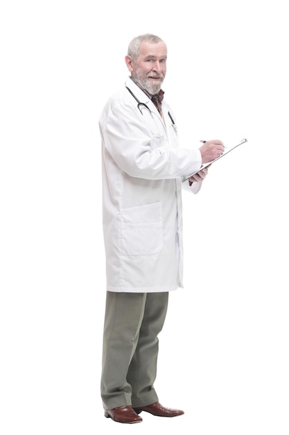 Elderly competent doctor with clipboard isolated on a white