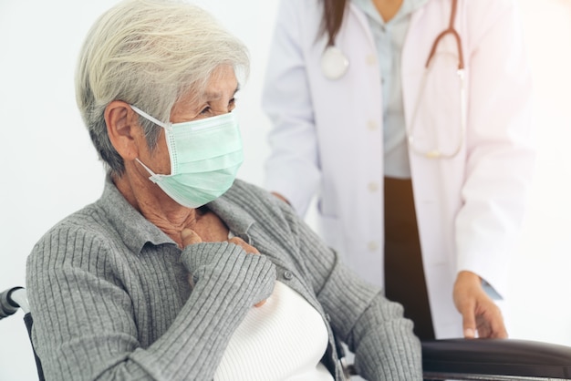 Elderly health check up , they wear surgical mask