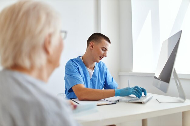 Photo elderly woman at the doctor39s appointment professional consultant