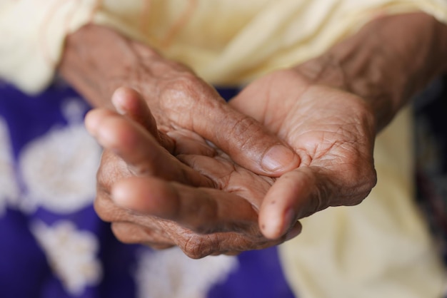 Elderly woman suffering from pain