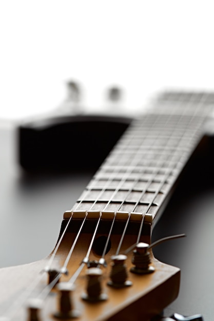 Electric guitar, closeup view on head, nobody