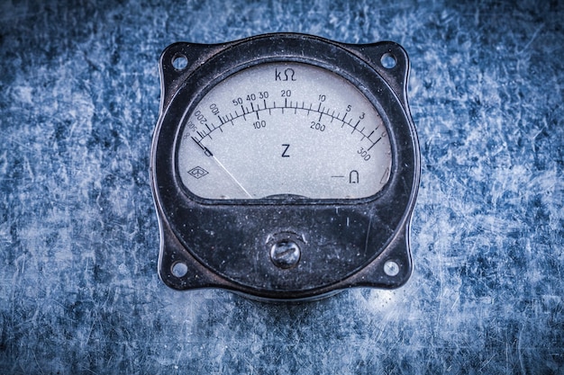 Electric instrument of measurement on metallic surface electricity concept