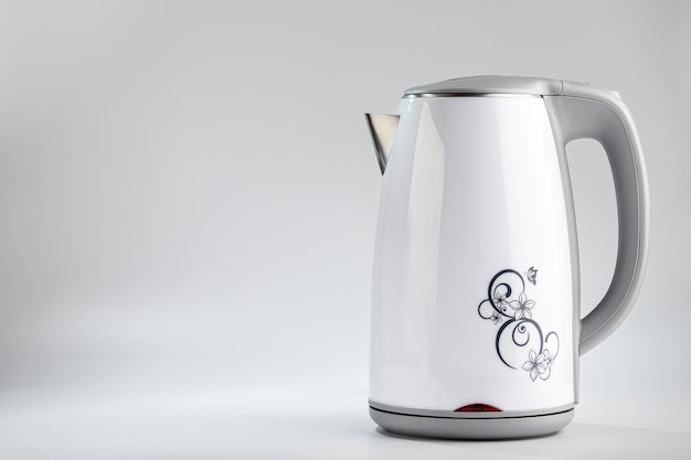 Electric kettle on a gray background