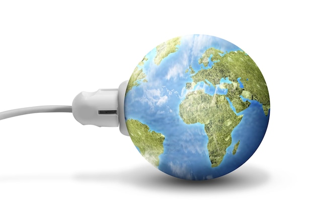 Electric plug into an earth power socket isolated over white background