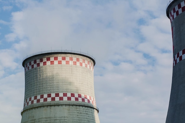 Electric power plant on sky background