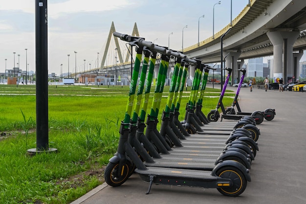 Electric scooter parking closeup New popular transport for exploring cities and sights Ecofriendly transport