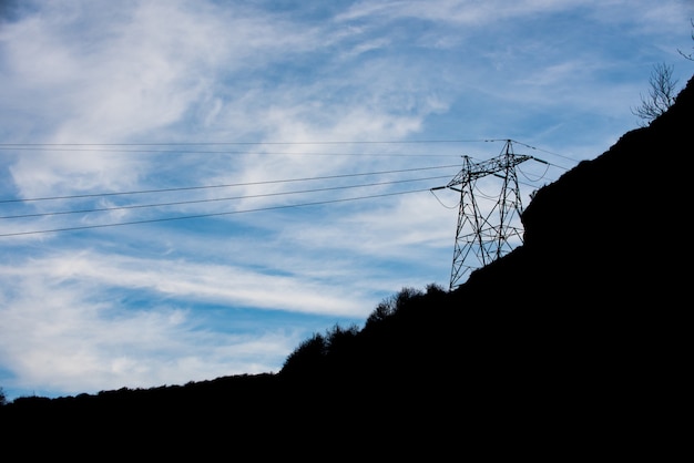 electric tower with blue sky