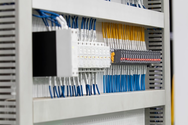 Electrical control Cabinet with controller and circuit breakers Industrial equipment background