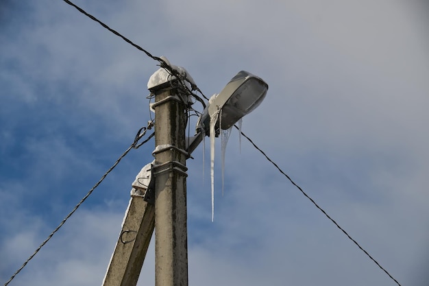 Electrical post with icicles adorning its sides