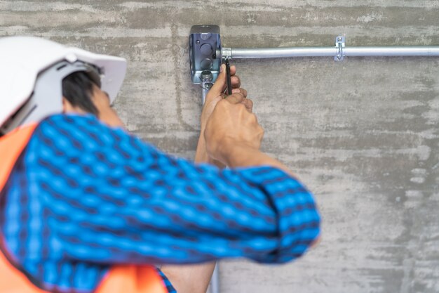 Electrician prepare to wire electrical.