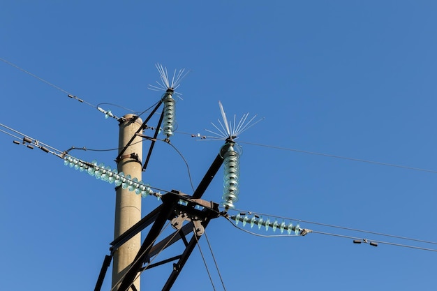 Electricity pylon with glass insulators and bird spikes