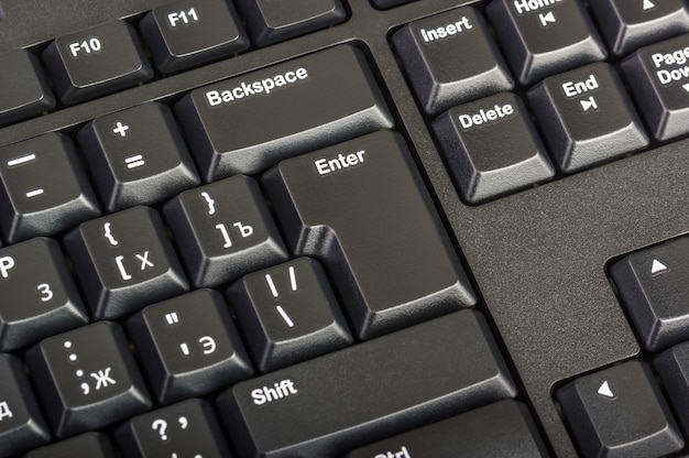 Electronic collection - close-up black computer keyboard with russian letter and key enter