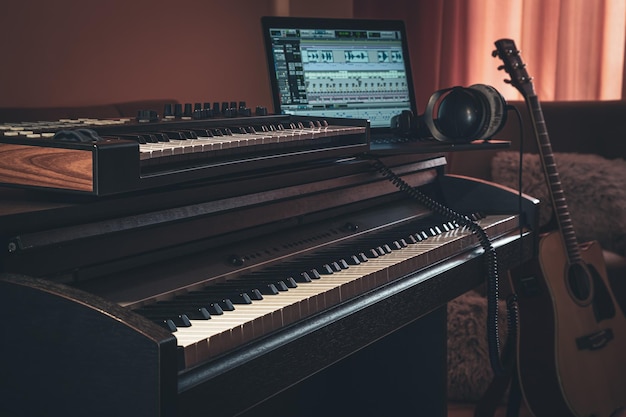 Electronic piano in the interior of the room on a blurred background