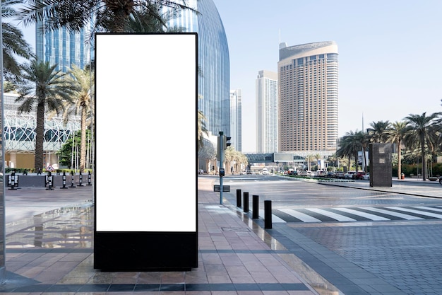 Electronic scoreboard with an empty white screen on a city street Copy space Advertising on the road