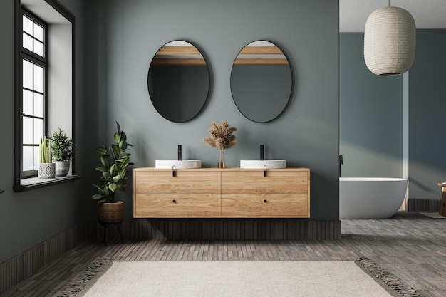 Elegant bathroom with blue tones walls white basin with oval mirrors bathtub shower plants and tiled floor Boho scandinavian bathroom