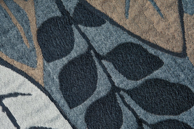 Elegant bluegray fabric with a floral pattern for design jakarta fabric texture with leaves in blue and gray color