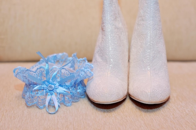 Elegant bridal shoes and wedding attributes