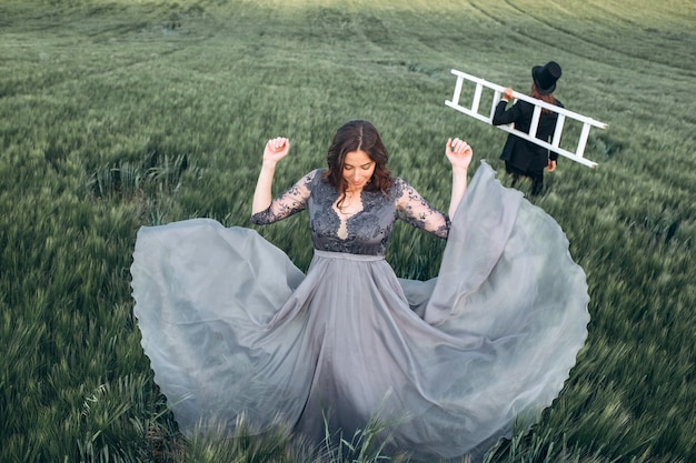 Elegant bride and groom walking and posing on green field